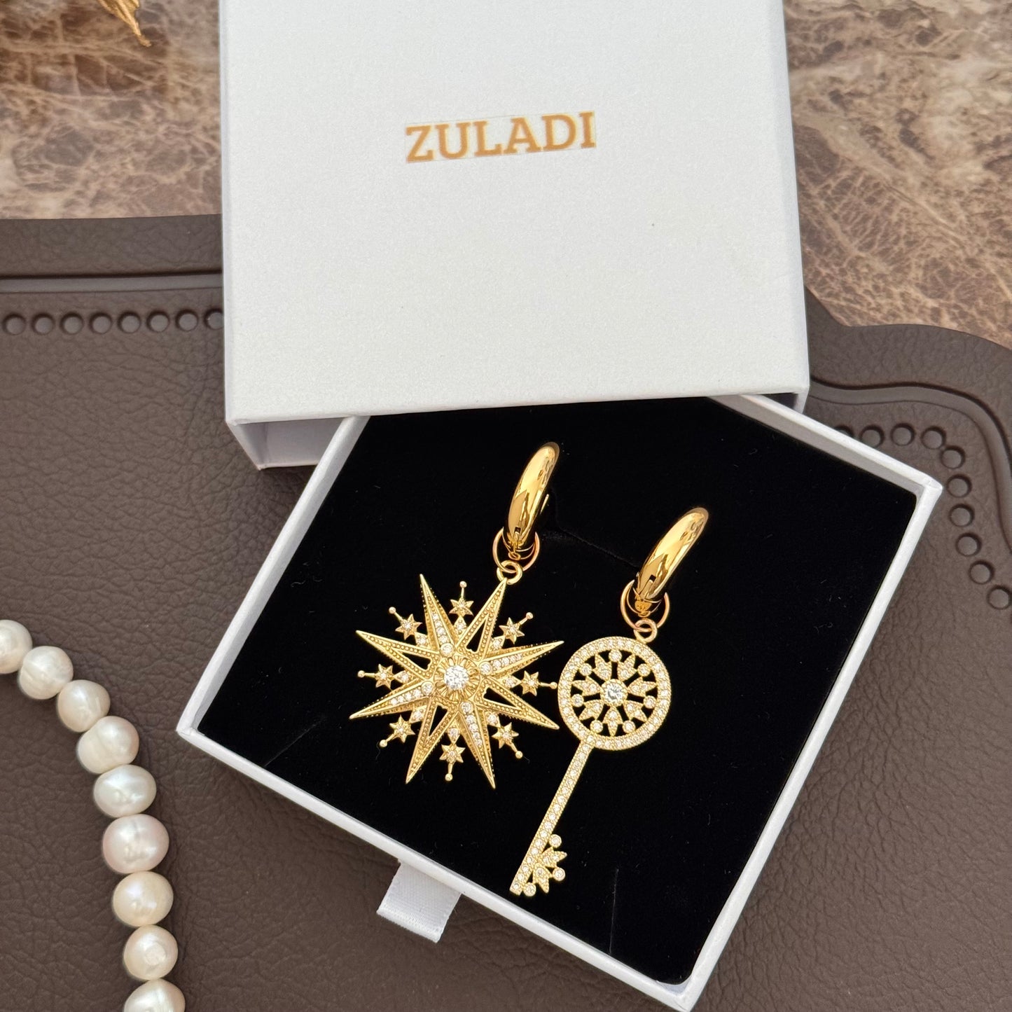 Celestia Asymetrical Star & Key Earrings