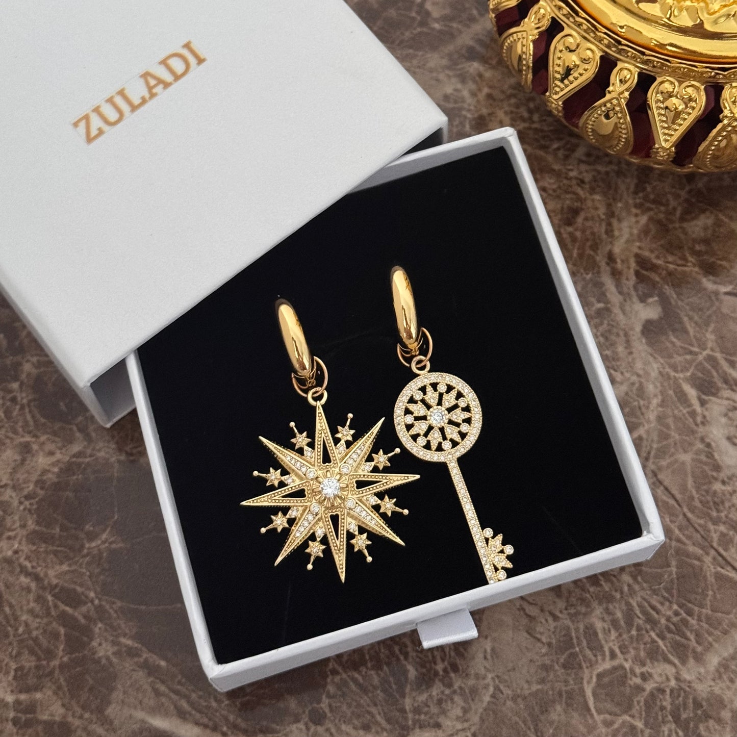 Celestia Asymetrical Star & Key Earrings